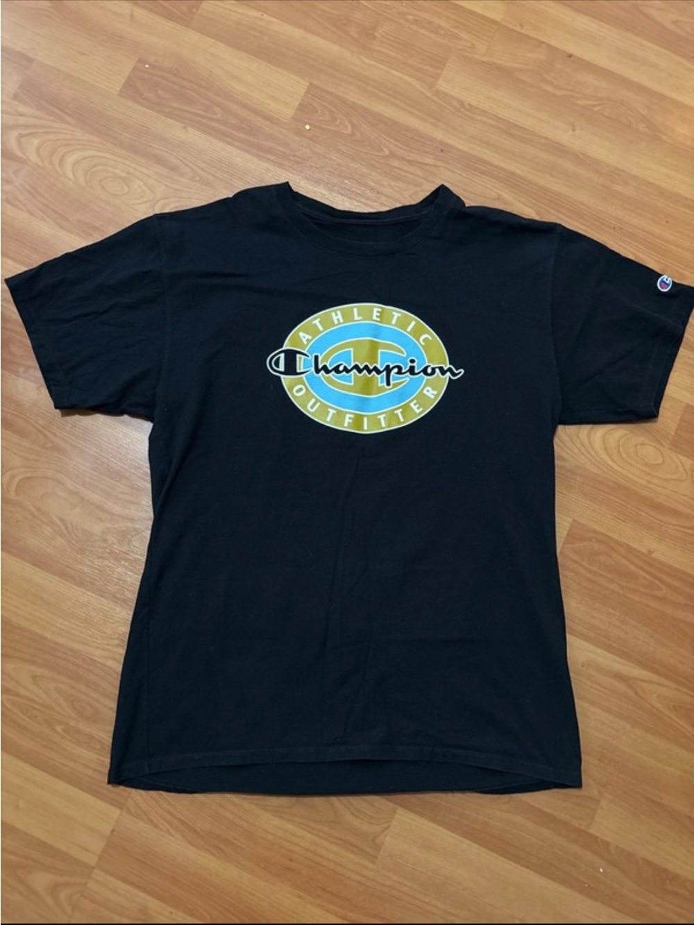 Champion Black Short-Sleeve Tee with Yellow & Blue Logo